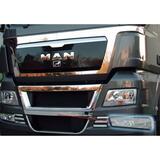Listwy ozdobne ze stali nierdzewnej na górny i dolny grill oraz drzwi z logo MAN TG-X XL / XLX / XXL